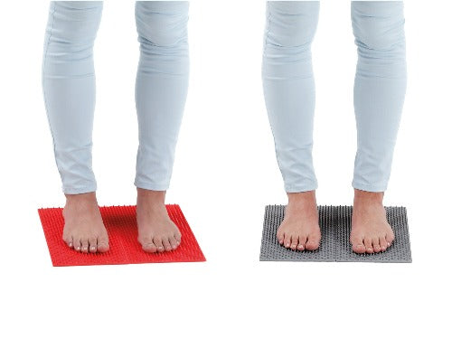 Standing on Aku Mat Comfort Red  and Pro Grey Version - Sensory Corner